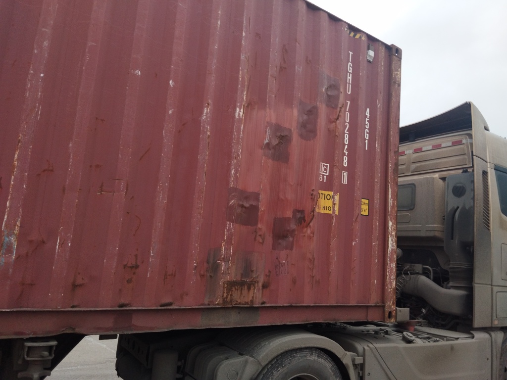 Морской контейнер TGHU7028481